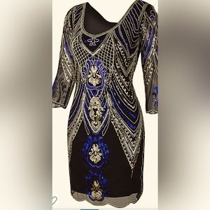 Women’s art deco sequin dress. Sheer long sleeves w/sequins.